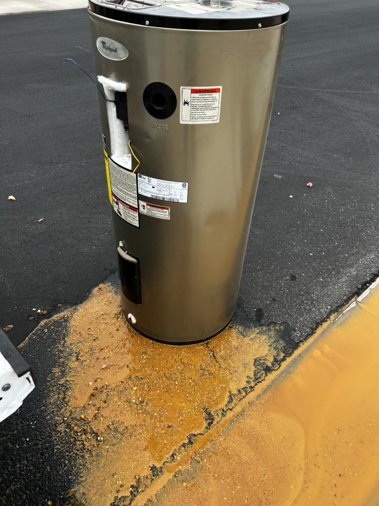 a drained water heater ready for disposal