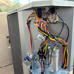 HVAC unit receiving maintenance - HVAC Company Phoenix